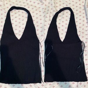 Cute black top with open back cut!